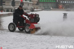 哈尔滨开启“冰雪模式” 最小清雪车亮相冰城（组图）